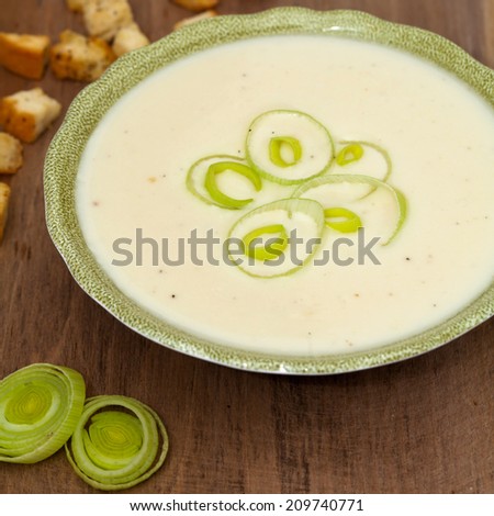 Leek and Potato soup with croutons. Selective focus.