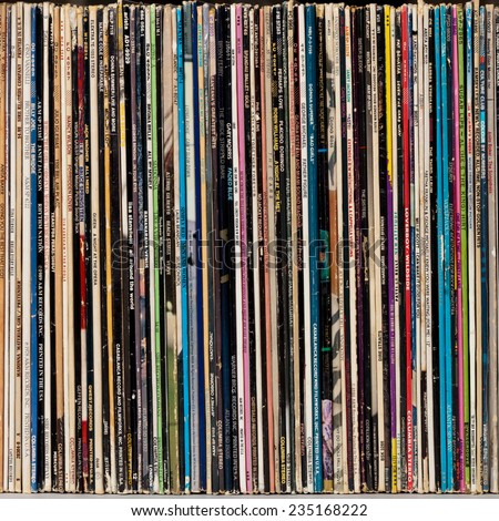 DETROIT, MI - September 01. 2014. Pile of various old dusty album sleeves. Vinyl LP Records.