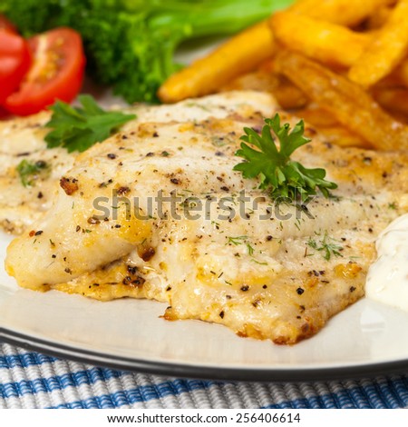 Baked white fish fillet. Selective focus.