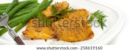 Breaded Fish Fillets. Panoramic image. Selective focus.
