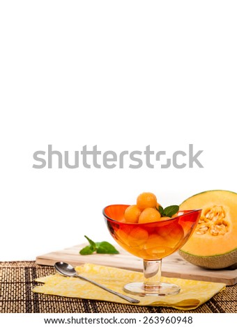 Cantaloupe Melon and Mint on white background. Shallow dof. Selective soft focus.