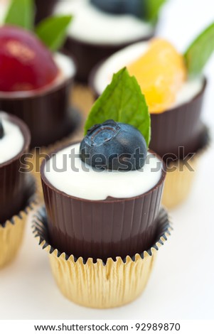 Mousse in chocolate dessert cups