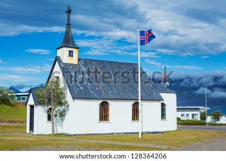 Remote Icelandic Lutheran church on the coast. Typical small simple structure of Icelandic churches