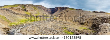 Hengifoss is the second highest waterfall on Iceland. The most special thing about the waterfall are multicolored layers in the basalt rock behind waterfall. Panorama