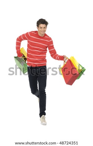 Happy man with shopping bag run