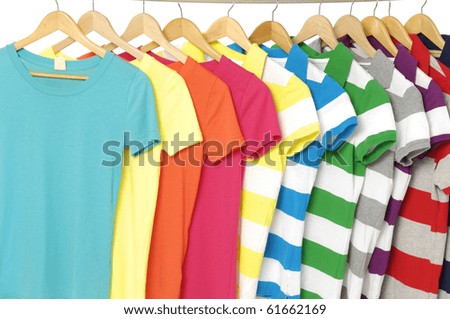 Row of colored Tee Shirts display