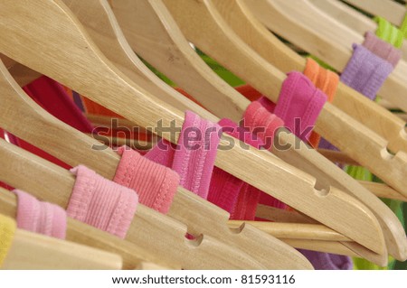 Row of colorful shirt rack -closeup