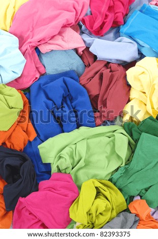 Big heap of colorful shirt clothes