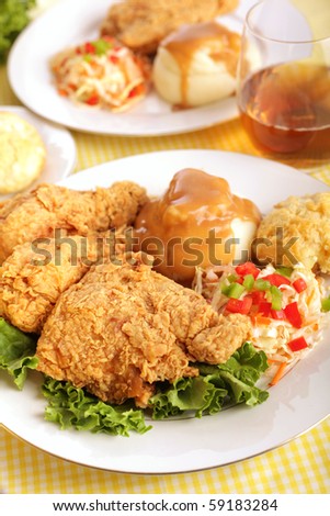 Deliciously golden brown fried chicken with all the tasty fixings