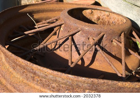 Rusted old wheel lying in scrapyard, sold as junk