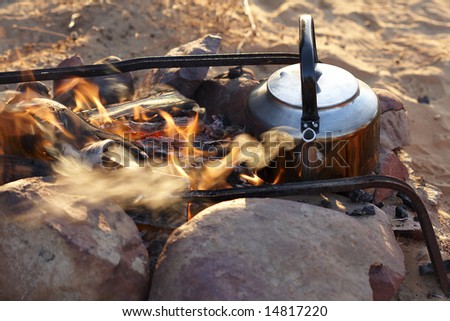 Coffee pot on an outside fire early in the morning