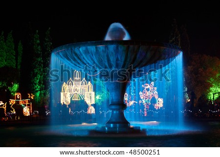Water feature at night with blue light at Chrstmas