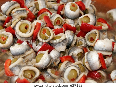 Olives rolled with fish in a bowl at a popular culture fair in Sileu, Mallorca, Spain