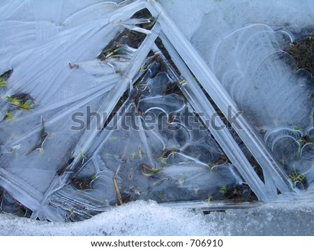 Frozen water forms a triangle in the early morning - Swiss Alps.