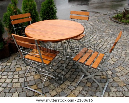 Cafe in the street after a rain.