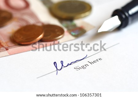 signing a deal with money