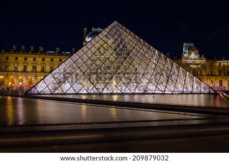 Paris-May 08: Louvre at Night during the Spring, May 08, 2013 in Paris. Louvre is the biggest Museum in Paris displayed over 60,000 square meters of exhibition space.