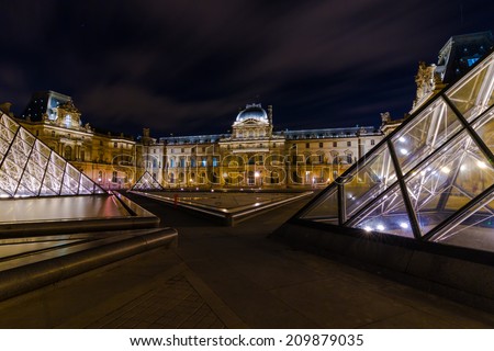 Paris-May 08: Louvre at Night during the Spring, May 08, 2013 in Paris. Louvre is the biggest Museum in Paris displayed over 60,000 square meters of exhibition space.