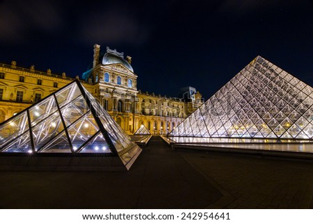 Paris-May 08: Louvre at Night during the Spring, May 08, 2013 in Paris. Louvre is the biggest Museum in Paris displayed over 60,000 square meters of exhibition space
