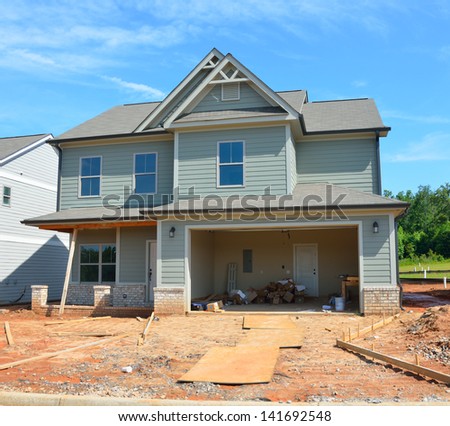 New home being constructed to sell al Georgia, USA. - stock photo