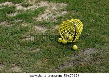bucket of driving range golf balls