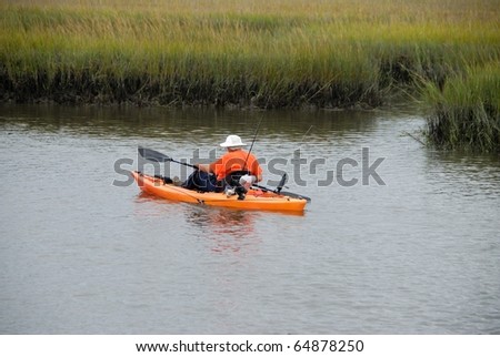 senior citizen kayaking on the st johns river near st augustine florida