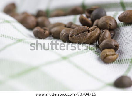 coffee beans an white textile