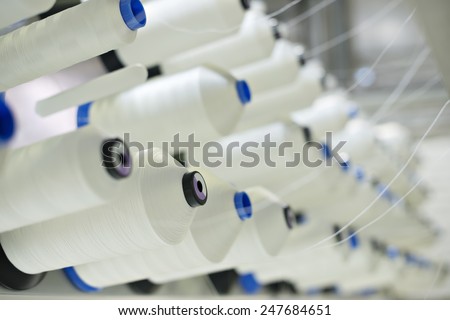 Coils synthetic thread. Spools of thread.
