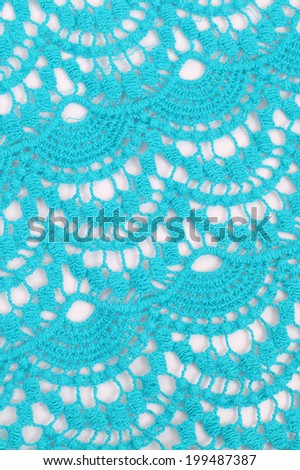 open-work blue textile background