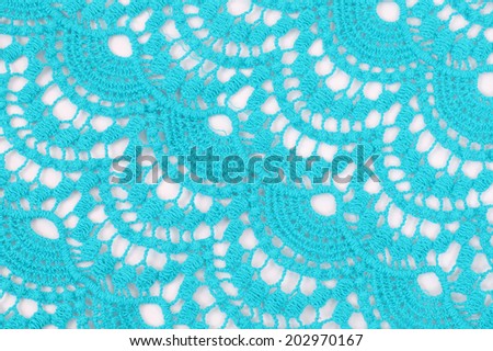 open-work blue textile background