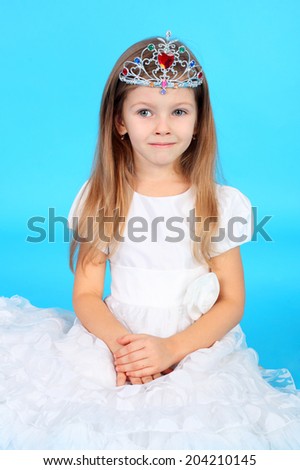 pretty little princess in the beautiful dress and diadem