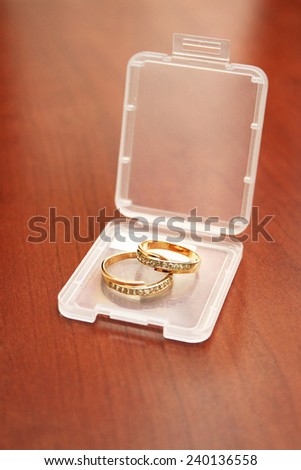 wedding rings in the box for the secure digital memory cards
