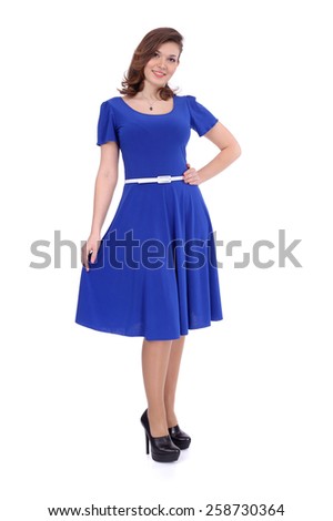 pretty young girl wearing blue dress with the white belt