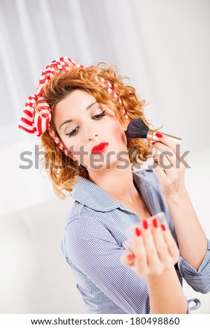 Portrait of elegant retro style woman/housewife with makeup