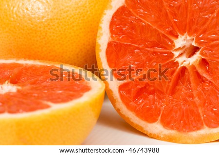 Halved red grapefruit close up