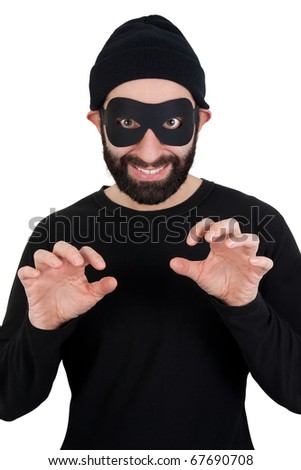 stock-photo-a-men-with-beard-dressed-as-a-funny-thief-black-clothes-black-woollen-hat-masked-eyes-smiling-67690708.jpg