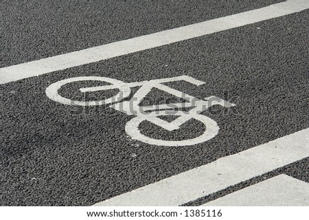 Bicycle drawn with white painting on the macadam.