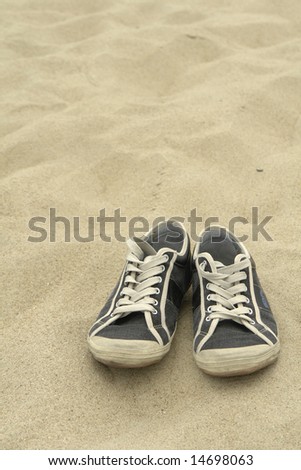 Shoes on the sand.
