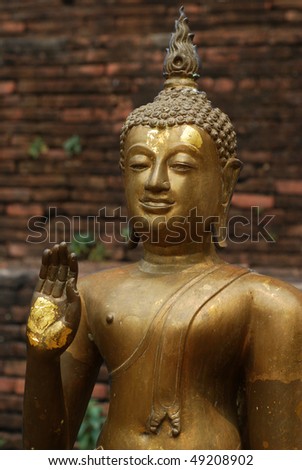 Bronze Buddhist Statue near temple in Chiang Mai, Thailand