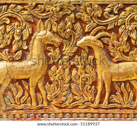 Bas-relief with animals on a wall of a buddhist temple, Thailand, Chiang Mai