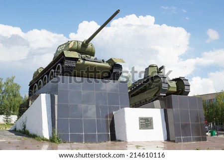 RUSSIA, NIZHNY NOVGOROD - AUG 17, 2014: T-34 tank and first russian Soviet tank (Freedom Fighter comrade Lenin). Installed on a pedestal near Sormovo plant, which produced them