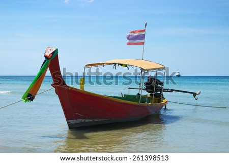 The so-called long-tailed Thai boat near the shore