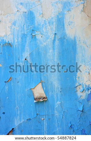 Plaster covered with old shabby blue  paint