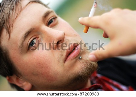 Guy Smoking Cigarette