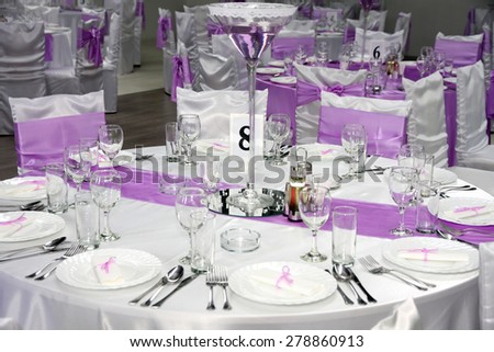 new and clean luxury empty restaurant with glasses set for dinner wedding day