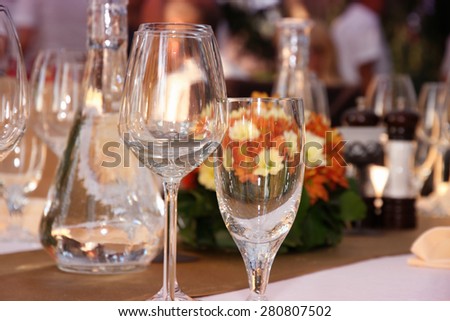 wineglasses setting on the arranged table in the restaurant