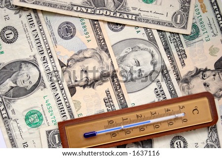 dollars and thermometer in closeup, stability