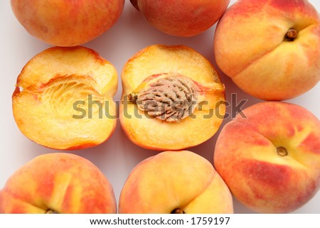 peaches and piece peach with seed