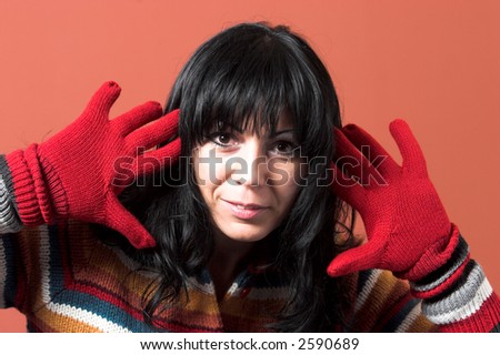 beautiful woman in sweater dress with glove