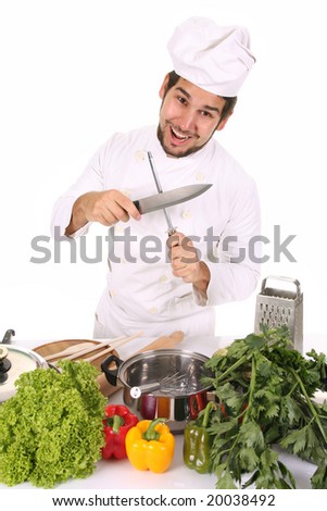chef sharpening a knife with sharpener
